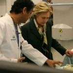 Presidential candidate Hillary Clinton examines a 3D printed vascular model at the Jacobs Institute, guided by Dr. Adnan H. Siddiqui, Chief Medical Officer of the Jacobs Institute. The model was produced on an Objet500 Connex3 3D Printer from Stratasys.