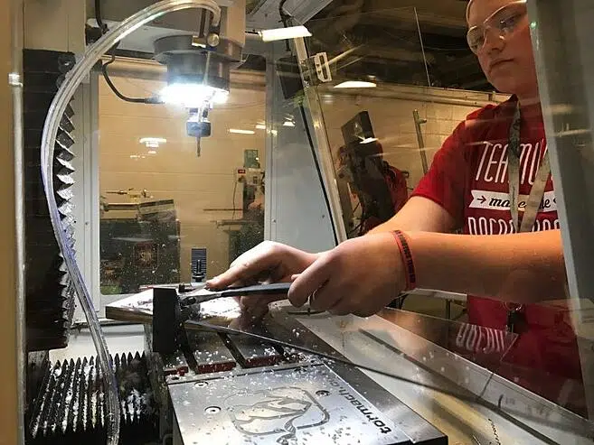First Robotics team using a Tormach CNC machine to make parts